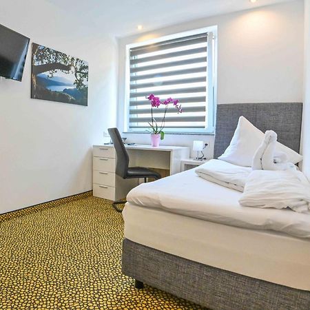 Hotel Bellevue Seeboden Quarto foto