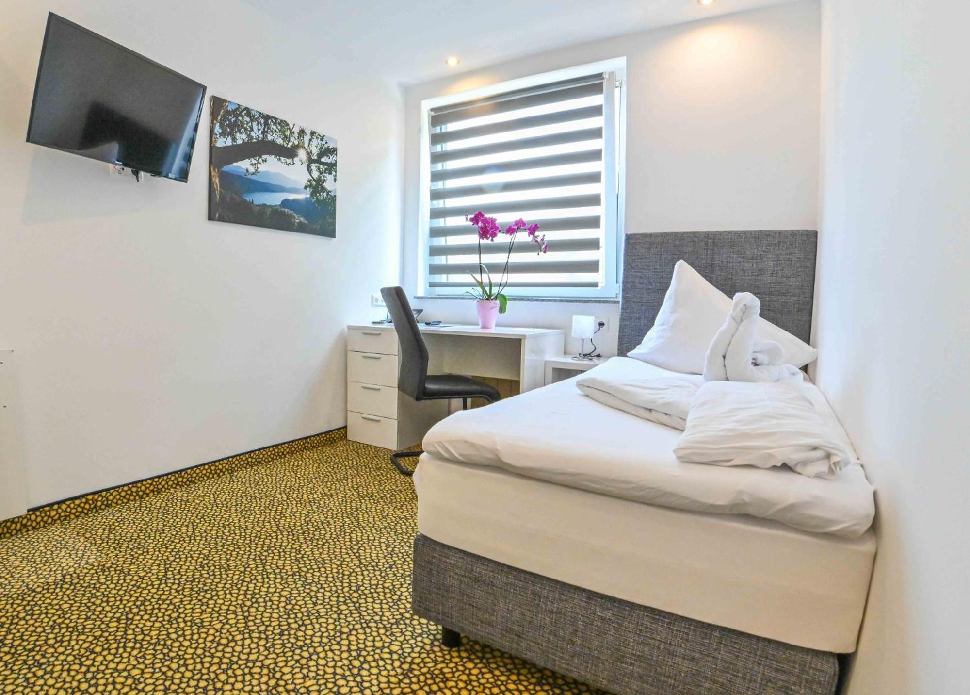 Hotel Bellevue Seeboden Quarto foto